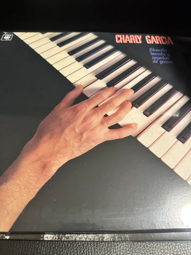 CHARLY GARCIA - FILOSOFIA BARATA Y ZAPATOS DE GOMA