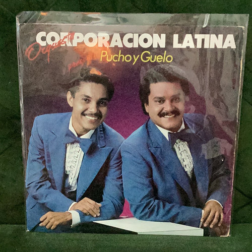 Corporacion Latina - Presenta Pucho y Guelo